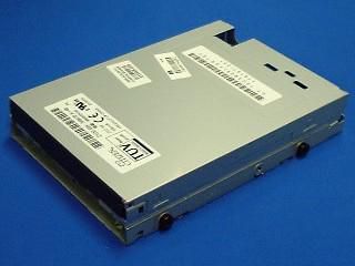 HP 1.44MB, 3.5-inch floppy disk drive without bezel or eject button (Carbon Black disk door) - Includes the four side mounted guide screws