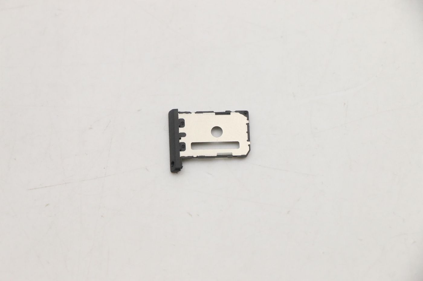 Mechanical cover for SIM tray