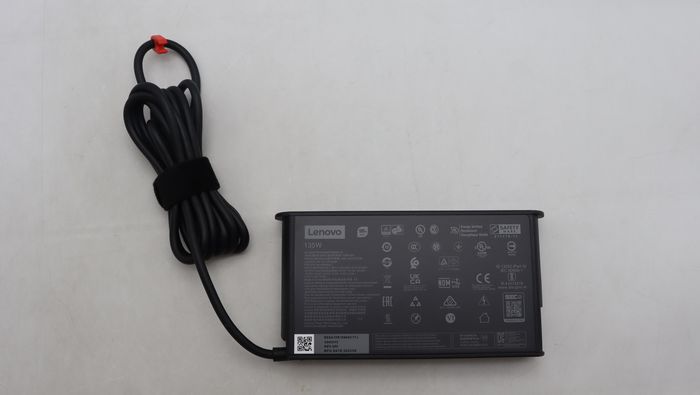 Lenovo 135W USB-C AC adapter with multiple voltage outputs (20V, 15V, 9V, 5V), suitable for Lenovo devices.